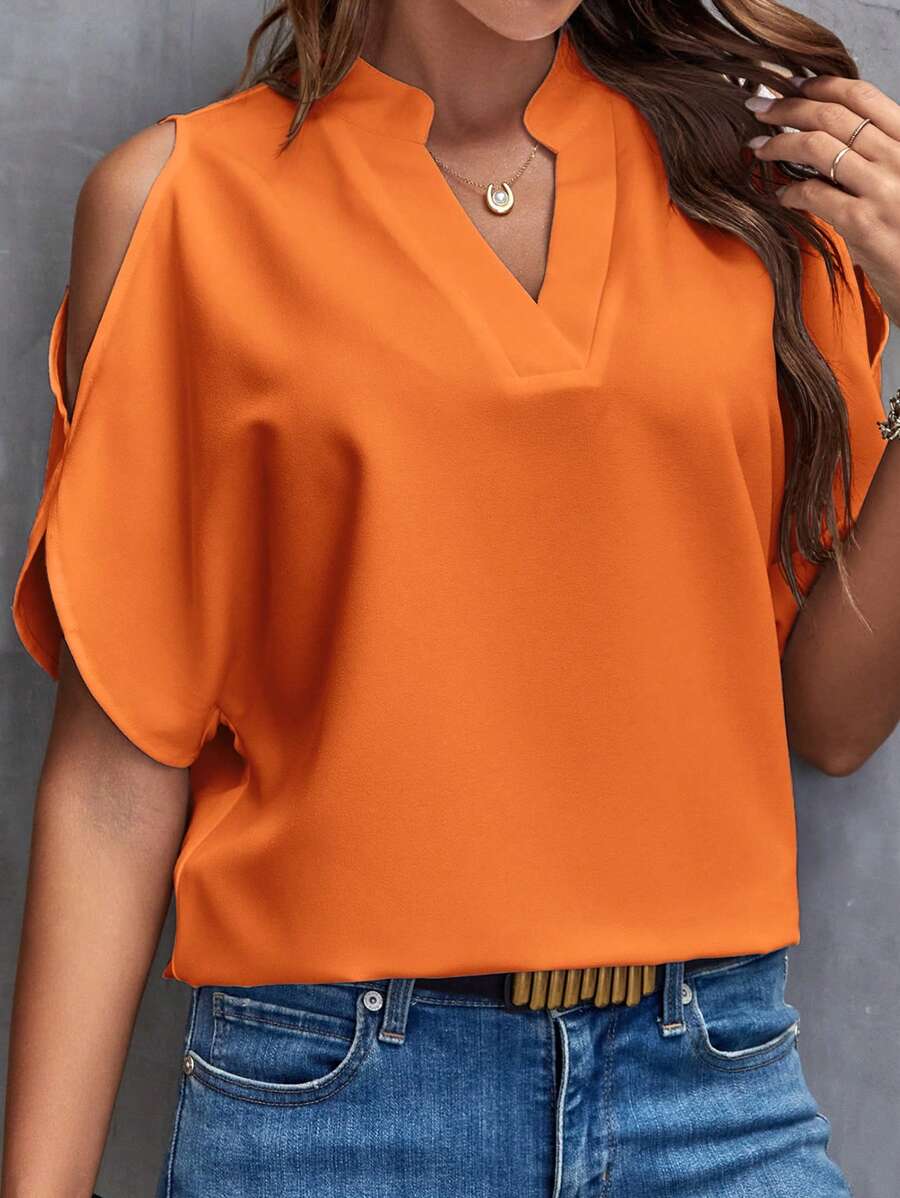 Bluse mit V-Ausschnitt und kurzen ausgestellten Ärmeln