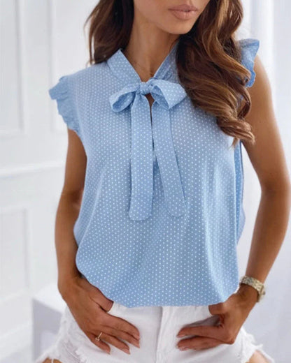 Elegante ärmellose Bluse mit Rüschen und Schleifendetail