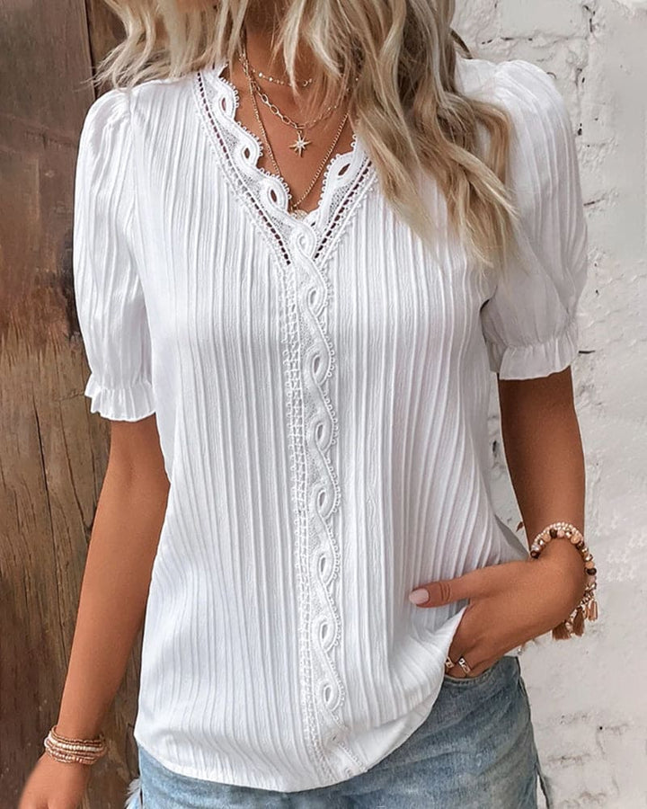 Elegante Spitzenbluse mit V-Ausschnitt
