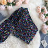 Glitzerndes One-Shoulder-Top