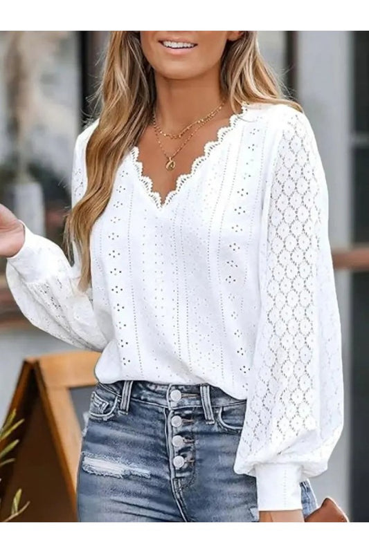 Elegante Bluse mit Spitzendetails und V-Ausschnitt